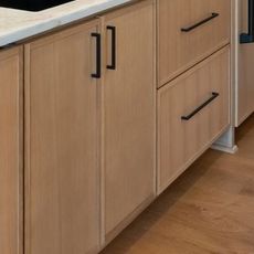 Close-up of Matte black pulls in the finished house