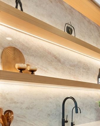 Lit shelves, wet bar